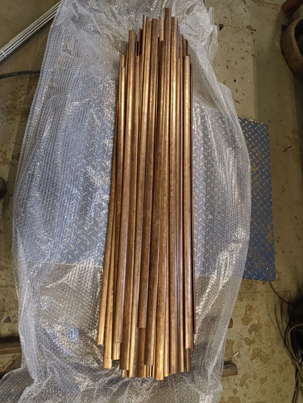 Copper-alloy rods with clean drawn surfaces prepared for supply