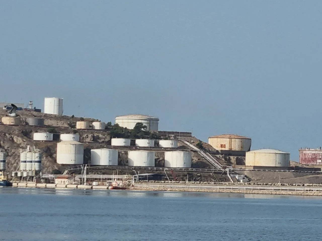 Industrial port terminal with bulk storage and cargo handling facilities